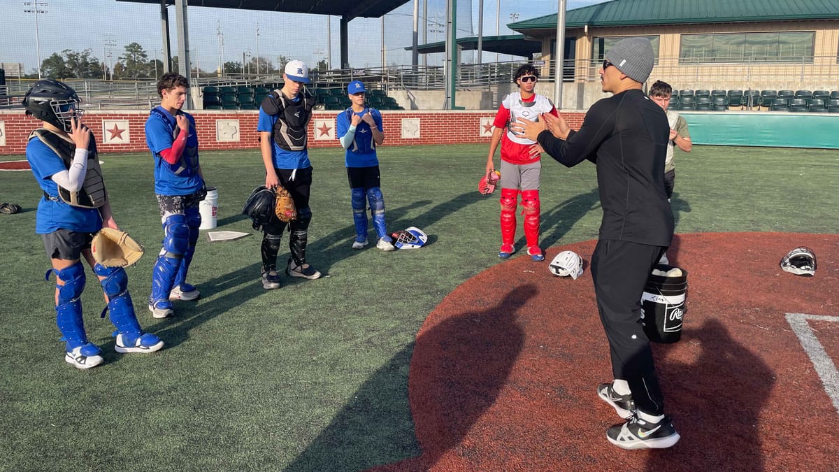 Coach Tres Barrera teaches Tomball Kings high school and junior high catchers at the Premier Baseball of Texas Sports Complex.